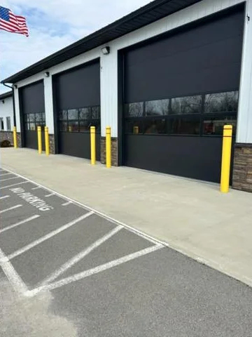 Commercial overhead doors with full view windows installed by A&K Metal and Doors in Southern Ohio